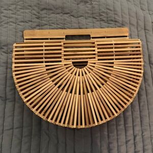 Bamboo stick spring purse